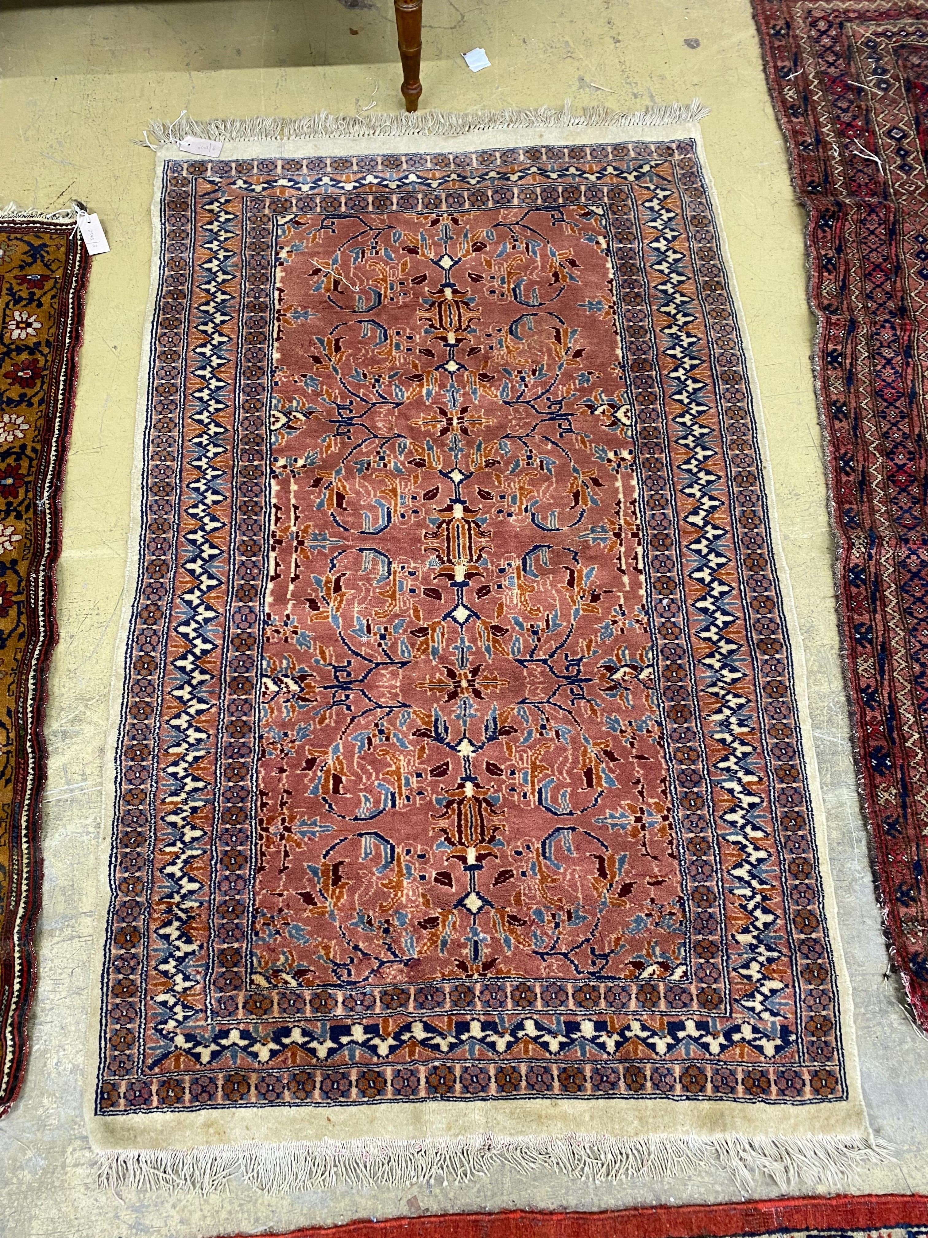 A North West Persian design peach ground rug, 160 x 102cm